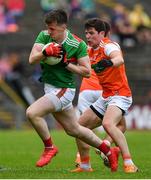 29 June 2019; Cillian O'Connor of Mayo in action against Paddy Burns of Armagh during the GAA Football All-Ireland Senior Championship Round 3 match between Mayo and Armagh at Elverys MacHale Park in Castlebar, Mayo. Photo by Brendan Moran/Sportsfile