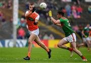 29 June 2019; Rian O'Neill of Armagh in action against Ciaran Tracey of Mayo during the GAA Football All-Ireland Senior Championship Round 3 match between Mayo and Armagh at Elverys MacHale Park in Castlebar, Mayo. Photo by Brendan Moran/Sportsfile