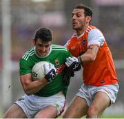 29 June 2019; Brendan Harrison of Mayo is tackled by Jamie Clarke of Armagh during the GAA Football All-Ireland Senior Championship Round 3 match between Mayo and Armagh at Elverys MacHale Park in Castlebar, Mayo. Photo by Brendan Moran/Sportsfile