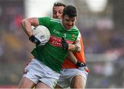 29 June 2019; Brendan Harrison of Mayo is tackled by Jamie Clarke of Armagh during the GAA Football All-Ireland Senior Championship Round 3 match between Mayo and Armagh at Elverys MacHale Park in Castlebar, Mayo. Photo by Brendan Moran/Sportsfile