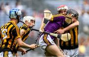 30 June 2019; Cian Molloy of Wexford is tackled by Liam Moore of Kilkenny during the Leinster GAA Hurling Minor Championship Final match between Kilkenny and Wexford at Croke Park in Dublin. Photo by Ramsey Cardy/Sportsfile
