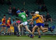 30 June 2019; Patrick Reale of Limerick in action against Jarlath Collins and Oisin Clune of Clare during the Electric Ireland Munster GAA Hurling Minor Championship Final match between Limerick and Clare at LIT Gaelic Grounds in Limerick. Photo by Brendan Moran/Sportsfile