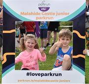30 June 2019; parkrun Ireland in partnership with Vhi, expanded their range of junior events to 21 with the introduction of the Malahide Castle junior parkrun on Sunday morning. Junior parkruns are 2km long and cater for 4 to 14-year olds, free of charge providing a fun and safe environment for children to enjoy exercise. To register for a parkrun near you visit www.parkrun.ie. Pictured are Eve Sullivan and Noah Duggan from Malahide, Co. Dublin, following the Malahide Castle Junior parkrun at Malahide Castle in Malahide, Dublin. Photo by Sam Barnes/Sportsfile