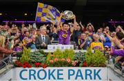 30 June 2019; Richie Lawlor of Wexford lifts the cup following their victory in the Leinster GAA Hurling Minor Championship Final match between Kilkenny and Wexford at Croke Park in Dublin. Photo by Ramsey Cardy/Sportsfile