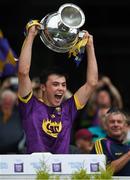30 June 2019; Richie Lawlor of Wexford lifts the cup after the Leinster GAA Hurling Minor Championship Final match between Kilkenny and Wexford at Croke Park in Dublin. Photo by Ray McManus/Sportsfile