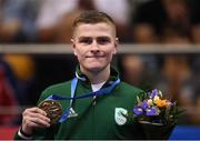 30 June 2019; Bronze medallist Regan Buckley of Ireland during the Men's Light Flyweight medal ceremony at Uruchie Sports Palace on Day 10 of the Minsk 2019 2nd European Games in Minsk, Belarus. Photo by Seb Daly/Sportsfile