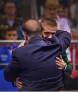 30 June 2019; Kurt Walker of Ireland is congratulated by Pierce O'Callaghan, Director of Sport, Minsk 2019, during the Men’s Bantamweight medal ceremony at Uruchie Sports Palace on Day 10 of the Minsk 2019 2nd European Games in Minsk, Belarus. Photo by Seb Daly/Sportsfile