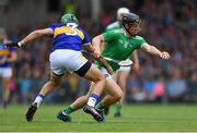 30 June 2019; Peter Casey of Limerick in action against James Barry of Tipperary  during the Munster GAA Hurling Senior Championship Final match between Limerick and Tipperary at LIT Gaelic Grounds in Limerick. Photo by Piaras Ó Mídheach/Sportsfile