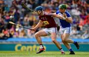 30 June 2019; Tommy Doyle of Westmeath in action against Willie Dunphy of Laois  during the Joe McDonagh Cup Final match between Laois and Westmeath at Croke Park in Dublin. Photo by Ray McManus/Sportsfile