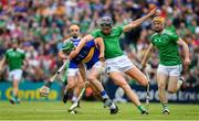 30 June 2019; John O'Dwyer of Tipperary is tackled by Gearoid Hegarty of Limerick during the Munster GAA Hurling Senior Championship Final match between Limerick and Tipperary at LIT Gaelic Grounds in Limerick. Photo by Brendan Moran/Sportsfile