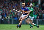 30 June 2019; Ronan Maher of Tipperary in action against Cian Lynch of Limerick during the Munster GAA Hurling Senior Championship Final match between Limerick and Tipperary at LIT Gaelic Grounds in Limerick. Photo by Brendan Moran/Sportsfile