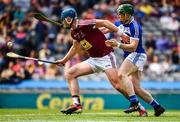 30 June 2019; Tommy Doyle of Westmeath in action against Willie Dunphy of Laois  during the Joe McDonagh Cup Final match between Laois and Westmeath at Croke Park in Dublin. Photo by Ray McManus/Sportsfile