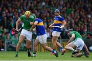 30 June 2019; Dan Morrissey of Limerick in action against John O'Dwyer of Tipperary during the Munster GAA Hurling Senior Championship Final match between Limerick and Tipperary at LIT Gaelic Grounds in Limerick. Photo by Brendan Moran/Sportsfile