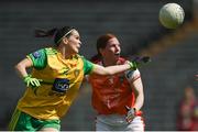 30 June 2019; Geraldine McLaughlin of Donegal in action against Caoimhe Morgan of Armagh during the Ladies Football Ulster Senior Championship Final match between Armagh and Donegal at St Tiernach's Park in Clones, Monaghan. Photo by Ben McShane/Sportsfile