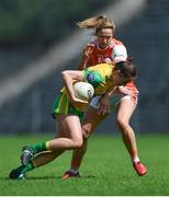 30 June 2019; Megan Ryan of Donegal in action against Caroline O'Hanlon of Armagh during the Ladies Football Ulster Senior Championship Final match between Armagh and Donegal at St Tiernach's Park in Clones, Monaghan. Photo by Ben McShane/Sportsfile