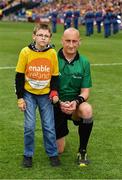 30 June 2019; Pictured is Brandon Burke with referee John Keenan, from Enable Ireland Children’s Services presenting the match sliotar at Croke Park for the Leinster Championship Hurling Final 201. Enable Ireland are the official charity partner of the GAA. Photo by Ray McManus/Sportsfile