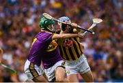 30 June 2019; TJ Reid of Kilkenny is tackled by Shaun Murphy of Wexford during the Leinster GAA Hurling Senior Championship Final match between Kilkenny and Wexford at Croke Park in Dublin. Photo by Ramsey Cardy/Sportsfile