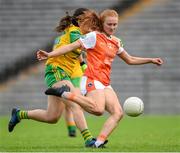 30 June 2019; Blaithin Mackin of Armagh has a shot on goal despite the attention of Evelyn McGinley of Donegal during the Ladies Football Ulster Senior Championship Final match between Armagh and Donegal at St Tiernach's Park in Clones, Monaghan. Photo by Ben McShane/Sportsfile