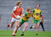 30 June 2019; Caroline O'Hanlon of Armagh in action against Kate Keeney of Donegal during the Ladies Football Ulster Senior Championship Final match between Armagh and Donegal at St Tiernach's Park in Clones, Monaghan. Photo by Ben McShane/Sportsfile