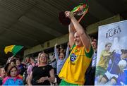 30 June 2019; Donegal captain Karen Guthrie lifts the Cup following the Ladies Football Ulster Senior Championship Final match between Armagh and Donegal at St Tiernach's Park in Clones, Monaghan. Photo by Ben McShane/Sportsfile
