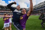 30 June 2019; Lee Chin of Wexford celebrates with Wexford manager Davy Fitzgerald after winning the Leinster GAA Hurling Senior Championship Final match between Kilkenny and Wexford at Croke Park in Dublin. Photo by Ramsey Cardy/Sportsfile
