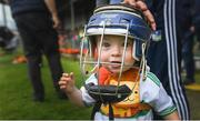 30 June 2019; Limerick supporter Thomas Quaid, age 18 months, son of Tommy Quaid, Limerick minor hurling selector, and nephew of Limerick senior goalkeeper Nickie Quaid, tries on a helmet at the Munster GAA Hurling Senior Championship Final match between Limerick and Tipperary at LIT Gaelic Grounds in Limerick. Photo by Piaras Ó Mídheach/Sportsfile