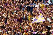 30 June 2019; Wexford supporters, on Hill 16, celebrate after their side had scored a penalty during the Leinster GAA Hurling Senior Championship Final match between Kilkenny and Wexford at Croke Park in Dublin. Photo by Ray McManus/Sportsfile
