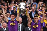30 June 2019; Joint Wexford captains Matthew O'Hanlon and Lee Chin lift the Bob O'Keefe Cup after the Leinster GAA Hurling Senior Championship Final match between Kilkenny and Wexford at Croke Park in Dublin. Photo by Ray McManus/Sportsfile