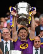 30 June 2019; Harry Kehoe of Wexford lifts the cup following the Leinster GAA Hurling Senior Championship Final match between Kilkenny and Wexford at Croke Park in Dublin. Photo by Ramsey Cardy/Sportsfile