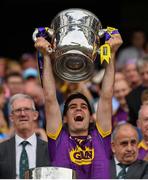 30 June 2019; Shaun Murphy of Wexford lifts the trophy following the Leinster GAA Hurling Senior Championship Final match between Kilkenny and Wexford at Croke Park in Dublin. Photo by Ramsey Cardy/Sportsfile