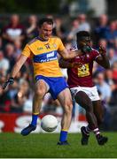 29 June 2019; David Tubridy of Clare shoots to score his side's first goal of the game despite the efforts of Boidu Sayeh of Westmeath during the GAA Football All-Ireland Senior Championship Round 3 match between Westmeath and Clare at TEG Cusack Park in Mullingar, Westmeath. Photo by Sam Barnes/Sportsfile