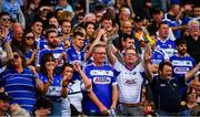30 June 2019; Laois supporters, in the Hogan Stand, celebrate after the Joe McDonagh Cup Final match between Laois and Westmeath at Croke Park in Dublin. Photo by Ray McManus/Sportsfile