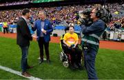 30 June 2019; Padhraic Dormer, right, from Enable Ireland adult services chatting to MC Dáithí Ó Sé and Donal Kitt, Partnerships and Philanthropy Executive, Enable Ireland during half time of the Leinster Championship Hurling Final 2019. Enable Ireland, official charity partner of the GAA, at Croke Park for the Leinster Championship Hurling Final 2019. Photo by Ramsey Cardy/Sportsfile