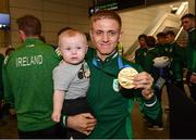 1 July 2019; Team Ireland boxer Kurt Walker with his nephew Rio on his return home from the Minsk 2019 European Games at Dublin Airport in Dublin. Photo by Eóin Noonan/Sportsfile