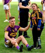 30 June 2019; Cathal Dunbar of Wexford and Jennifer Malone following the Leinster GAA Hurling Senior Championship Final match between Kilkenny and Wexford at Croke Park in Dublin. Photo by Ramsey Cardy/Sportsfile