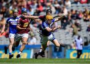 30 June 2019; Mark Kavanagh of Laois in action against Aonghus Clarke of Westmeath during the Joe McDonagh Cup Final match between Laois and Westmeath at Croke Park in Dublin. Photo by Daire Brennan/Sportsfile