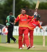 1 July 2019; Craig Ervine of Zimbabwe celebrates after his 100th run during the Men’s Cricket 1st One Day International match between Ireland and Zimbabwe at Bready Cricket Club in Magheramason, Tyrone. Photo by Oliver McVeigh/Sportsfile