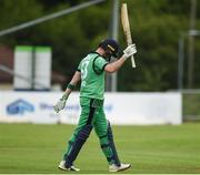 1 July 2019; Andrew Balbirnie of Ireland celebrates his century of runs during the Men’s Cricket 1st One Day International match between Ireland and Zimbabwe at Bready Cricket Club in Magheramason, Tyrone. Photo by Oliver McVeigh/Sportsfile
