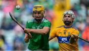 30 June 2019; Cathal O’Neill of Limerick in action against Killian O'Connor of Clare during the Electric Ireland Munster GAA Hurling Minor Championship Final match between Limerick and Clare at LIT Gaelic Grounds in Limerick. Photo by Piaras Ó Mídheach/Sportsfile