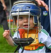 30 June 2019; Limerick supporter Thomas Quaid, age 18 months, son of Tommy Quaid, Limerick minor hurling selector, and nephew of Limerick senior goalkeeper Nickie Quaid, tries on a helmet at the Munster GAA Hurling Senior Championship Final match between Limerick and Tipperary at LIT Gaelic Grounds in Limerick. Photo by Piaras Ó Mídheach/Sportsfile