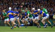 30 June 2019; Noel McGrath of Tipperary, centre, tries to gather possession as William O’Donoghue of Limerick closes in during the Munster GAA Hurling Senior Championship Final match between Limerick and Tipperary at LIT Gaelic Grounds in Limerick. Photo by Piaras Ó Mídheach/Sportsfile