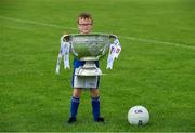 2 July 2019; Seven year old Joe Mallen, a member of the host club, with the Sam Maguire Cup before the GAA Football All Ireland Senior Championship Series National Launch at Scotstown GAA Club, St Mary's Park, Scotstown, Co. Monaghan. Photo by Ray McManus/Sportsfile