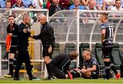 28 June 2019; John Mountney of Dundalk receives medical attention following a challenge from Trevor Clarke of Shamrock Rovers during the SSE Airtricity League Premier Division match between Shamrock Rovers and Dundalk at Tallaght Stadium in Dublin. Photo by Ben McShane/Sportsfile