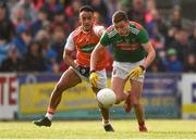 29 June 2019; Fionn McDonagh of Mayo in action against Jemar Hall of Armagh during the GAA Football All-Ireland Senior Championship Round 3 match between Mayo and Armagh at Elverys MacHale Park in Castlebar, Mayo. Photo by Ben McShane/Sportsfile