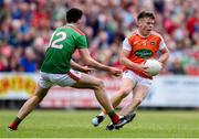 29 June 2019; Aidan Nugent of Armagh in action against Mikey Murray of Mayo during the GAA Football All-Ireland Senior Championship Round 3 match between Mayo and Armagh at Elverys MacHale Park in Castlebar, Mayo. Photo by Ben McShane/Sportsfile