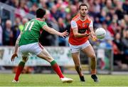 29 June 2019; Jamie Clarke of Armagh in action against Conor Loftus of Mayo during the GAA Football All-Ireland Senior Championship Round 3 match between Mayo and Armagh at Elverys MacHale Park in Castlebar, Mayo. Photo by Ben McShane/Sportsfile