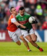 29 June 2019; Kevin McLoughlin of Mayo in action against Mark Shields of Armagh during the GAA Football All-Ireland Senior Championship Round 3 match between Mayo and Armagh at Elverys MacHale Park in Castlebar, Mayo. Photo by Ben McShane/Sportsfile