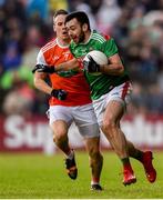 29 June 2019; Kevin McLoughlin of Mayo in action against Mark Shields of Armagh during the GAA Football All-Ireland Senior Championship Round 3 match between Mayo and Armagh at Elverys MacHale Park in Castlebar, Mayo. Photo by Ben McShane/Sportsfile