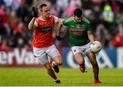 29 June 2019; Kevin McLoughlin of Mayo in action against Mark Shields of Armagh during the GAA Football All-Ireland Senior Championship Round 3 match between Mayo and Armagh at Elverys MacHale Park in Castlebar, Mayo. Photo by Ben McShane/Sportsfile