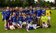 2 July 2019; Boys and girls from the host club with the Sam Maguire during the GAA Football All Ireland Senior Championship Series National Launch at Scotstown GAA Club, St Mary's Park, Scotstown, Co. Monaghan. Photo by Ray McManus/Sportsfile